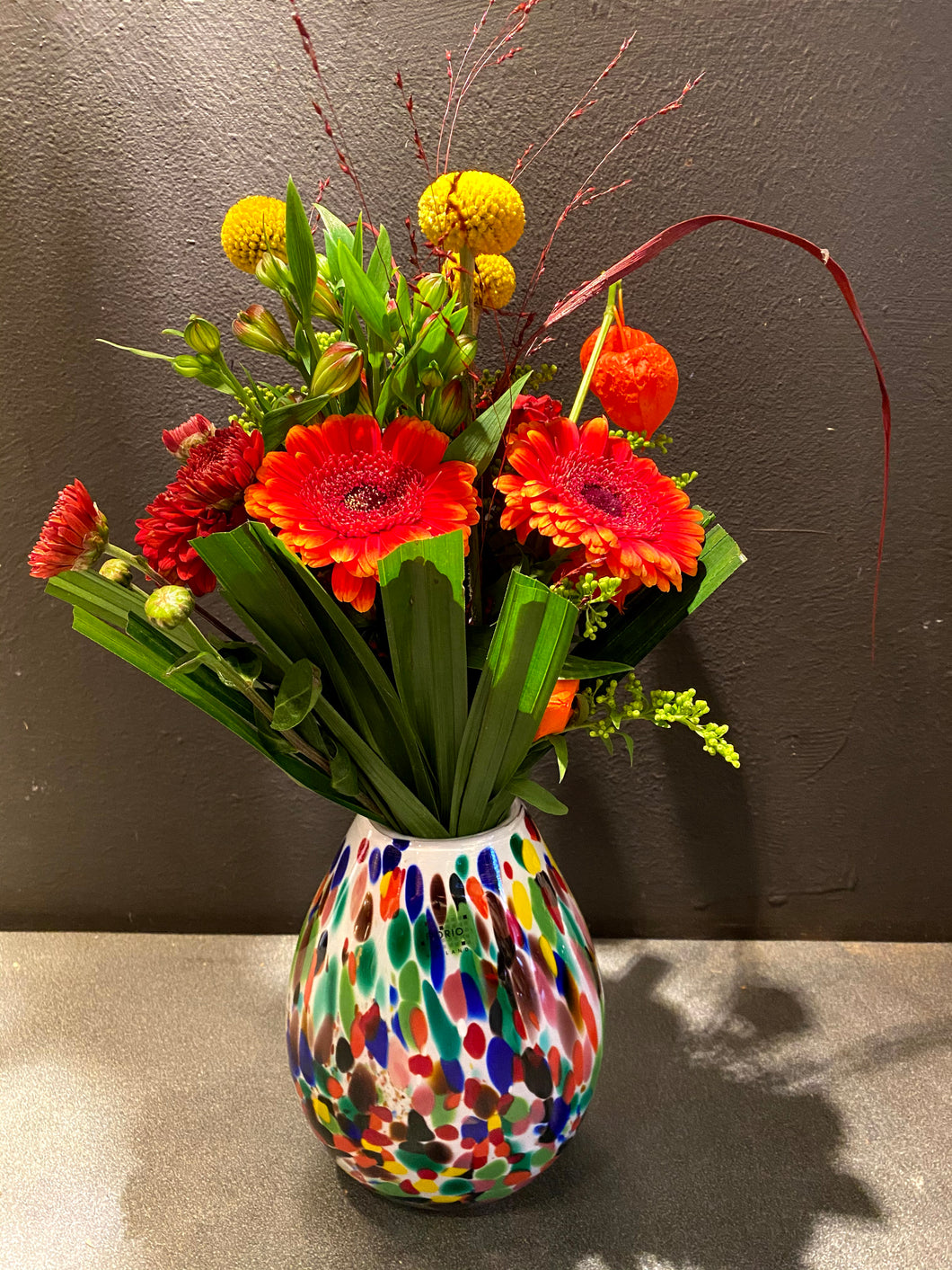 Fidrio spikkelvaas met bloemen